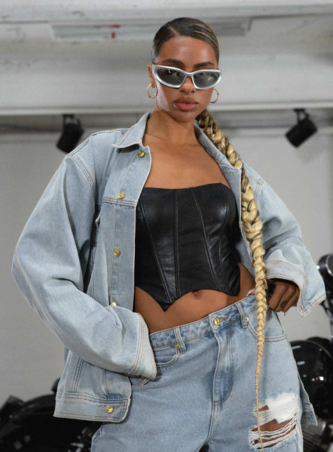 Denim jacket Light wash denim Classic collar Button fastening at front Four pocket design Gold-toned hardware Embroidered graphic at back