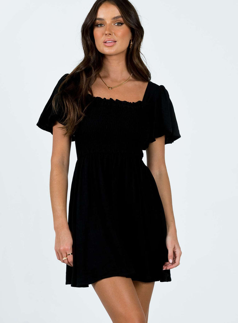 Front view of model wearing  front Princess Polly Square Neck  Imagine Mini Dress Black