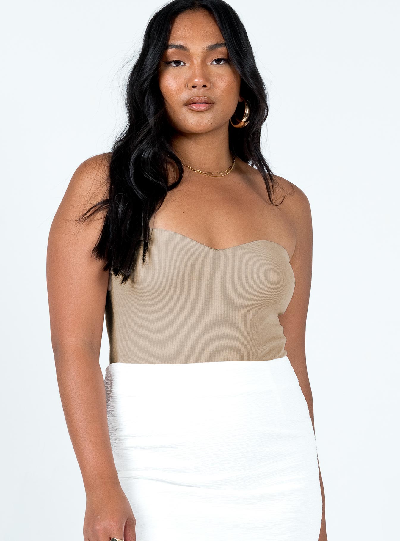 side view of model wearing Princess Polly Aston Strapless Bodysuit Beige Sleeveless Sweetheart 