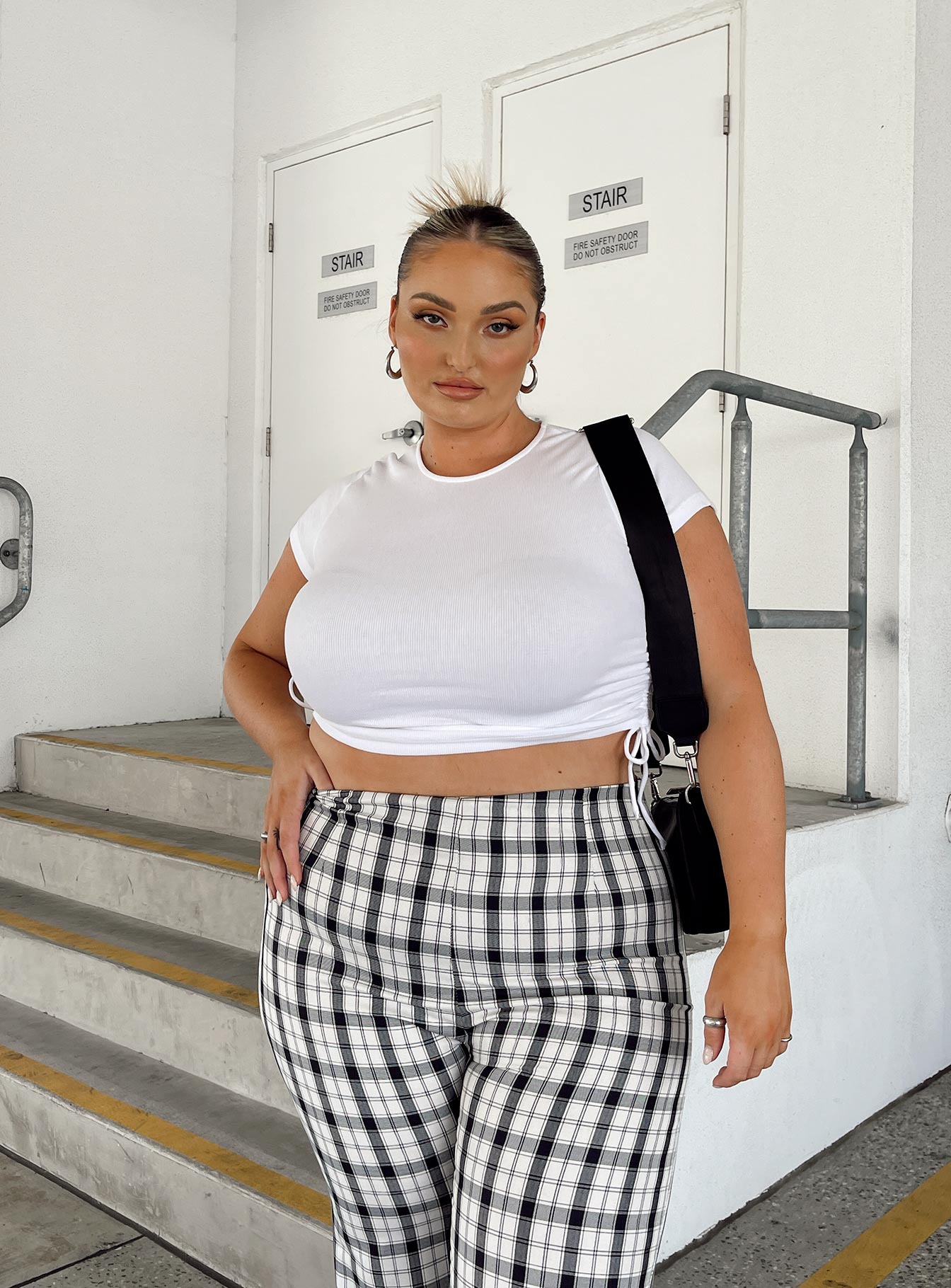 front view of model wearing Princess Polly Evant Tee White Curve 