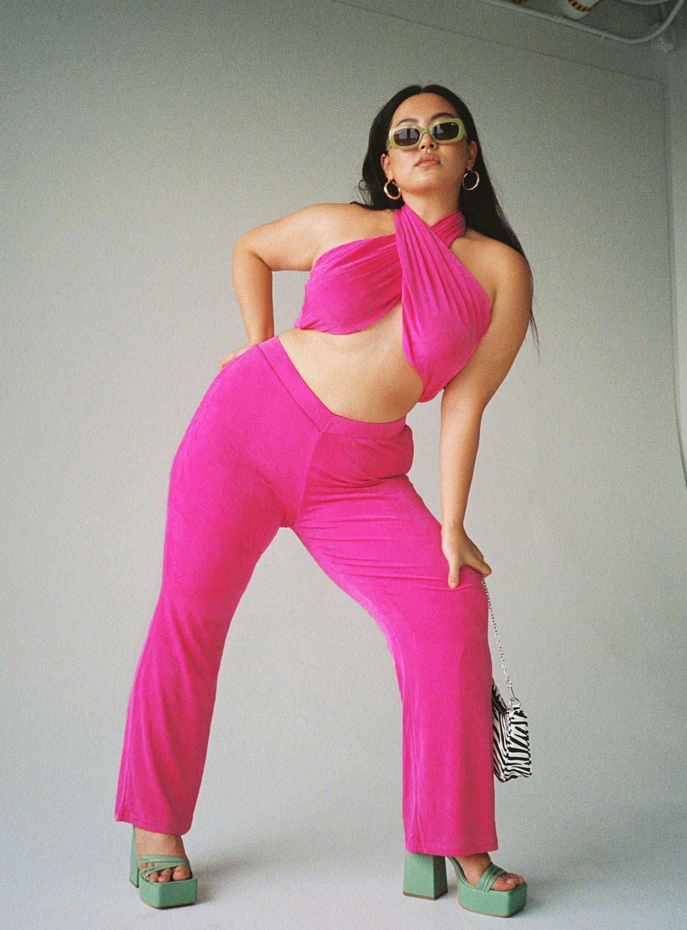 Pink matching set Crop top Strapless style Can be tied multiple ways High waist pants V-shaped waist Flared leg Elasticated waistband
