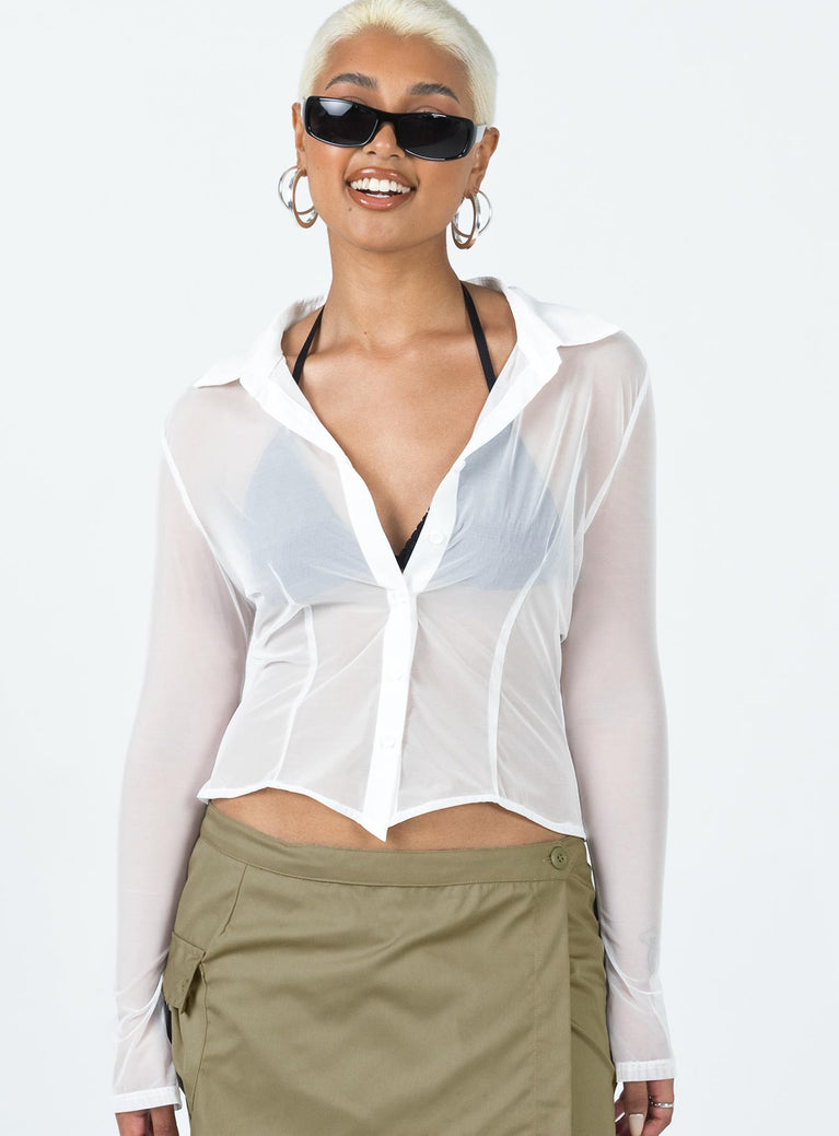 Front view of model wearing  front Princess Polly Sleeveless V-Neck  Banner Mesh Shirt Ivory