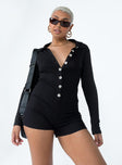 Black playsuit Ribbed material Classic collar Button front fastening Good stretch