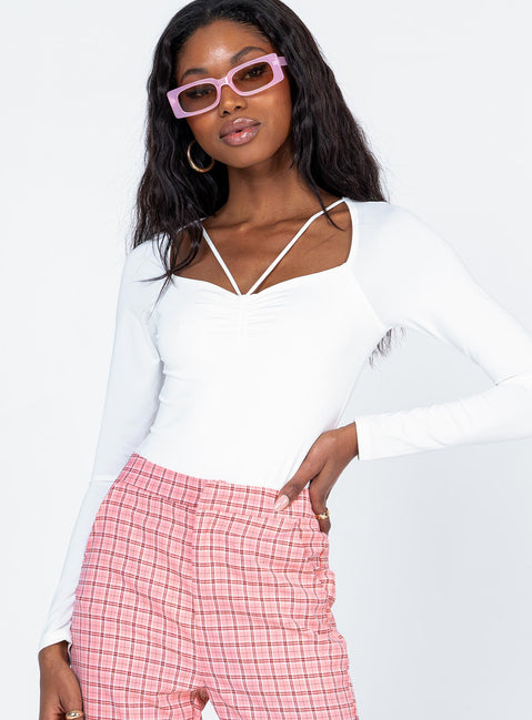 front view of model wearing Princess Polly Tori Long Sleeve Bodysuit White Full Sleeves Sweetheart 