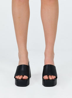 Black mules Faux leather material Single wide upper Block heel Platform base