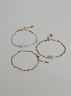 Bracelet pack Gold toned Lobster clasp fastening  Pearl and cross details