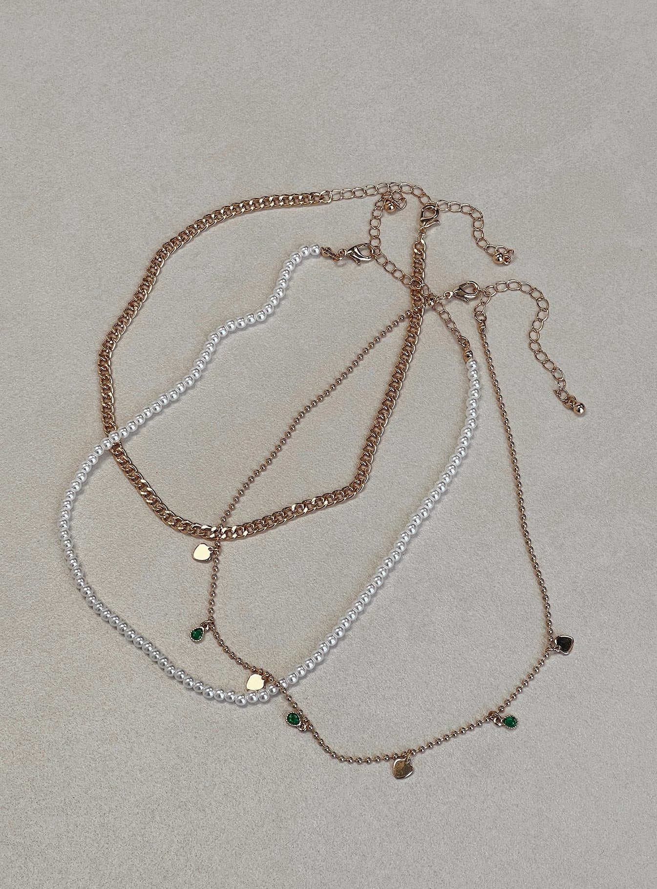 Necklace Gold toned Three chains - these can be worn separately Pearl and gemstone detail Lobster clasp fastening Adjustable lengths