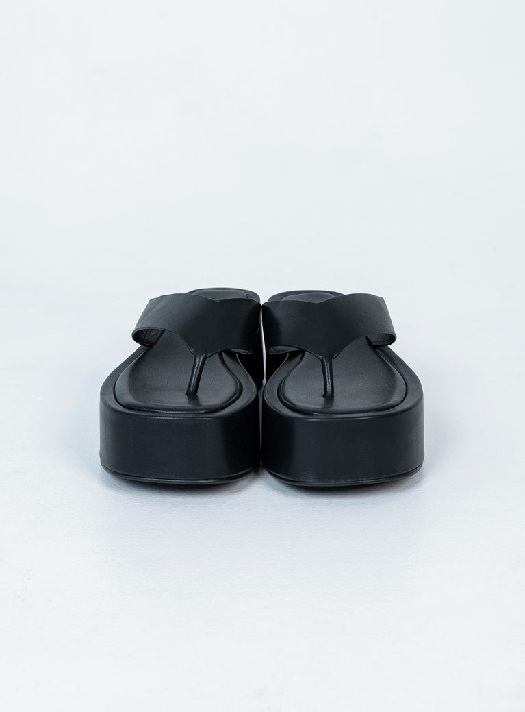 Sandals Upper & Lining: 100% PU Outsole: 100% rubber Faux leather material  Flip-flop style upper  Platform base Square toe 