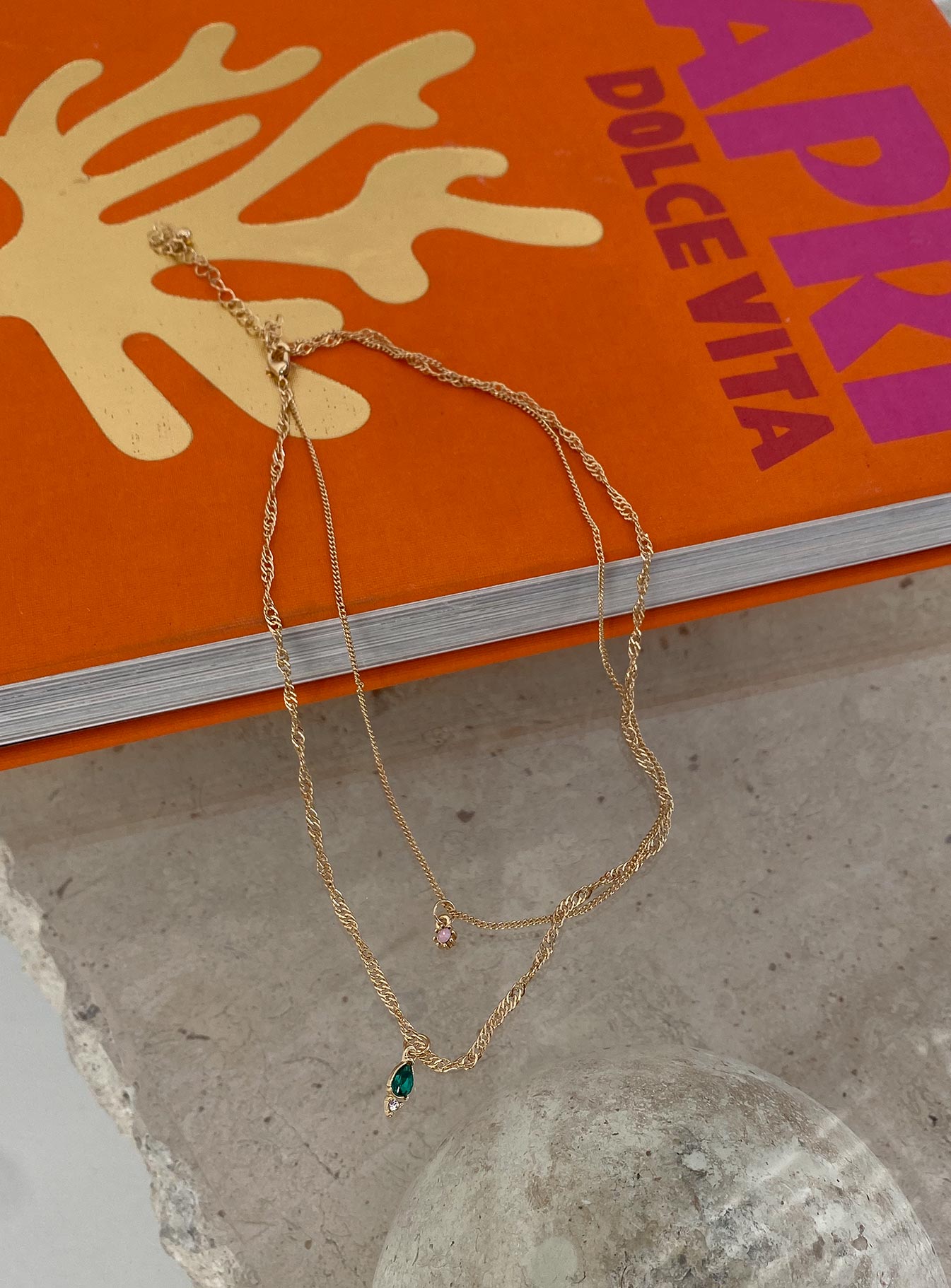 Necklace pack 90% recycled steel 5% recycled zinc 5% glass Pack of two  Fixed design - these can not be worn separately  Dainty gold chains  Small pendants  Lobster clasp fastening 