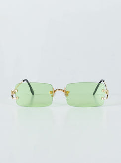 Sunglasses  50% PC 50% Metal UV 400 Frameless design  Gold-toned metal arms  Adjustable silicone nose pads  Green tinted lenses 