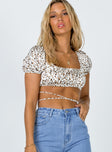 front view of model wearing Princess Polly Starling Crop Top Beige Leopard 