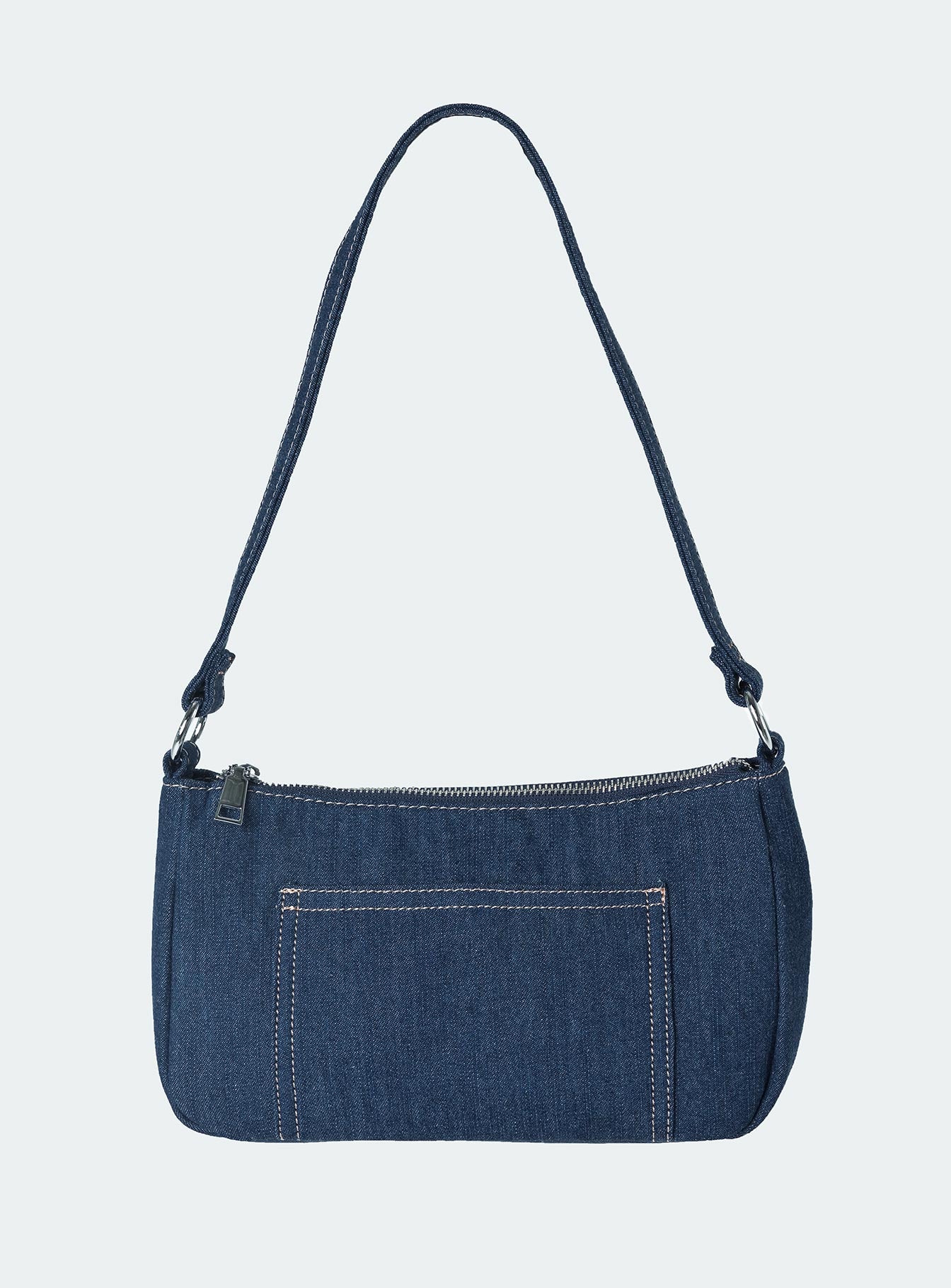 Shoulder bag Dark wash denim material Fixed shoulder strap Zip fastening Silver toned hardware External and internal slip pockets