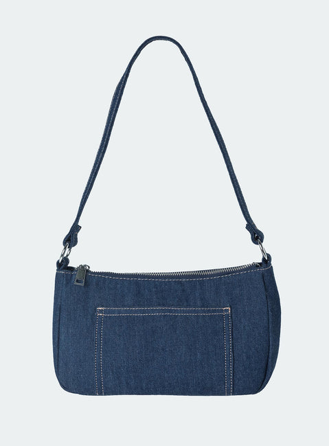 Shoulder bag Dark wash denim material Fixed shoulder strap Zip fastening Silver toned hardware External and internal slip pockets