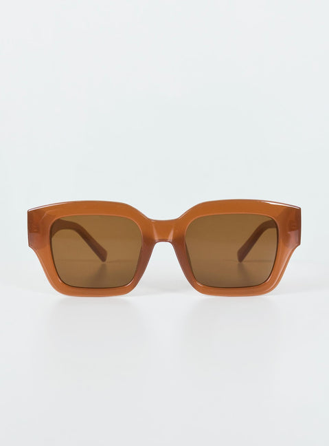 Brown sunglasses Oversized frame  Brown tinted lenses Moulded nose bridge  