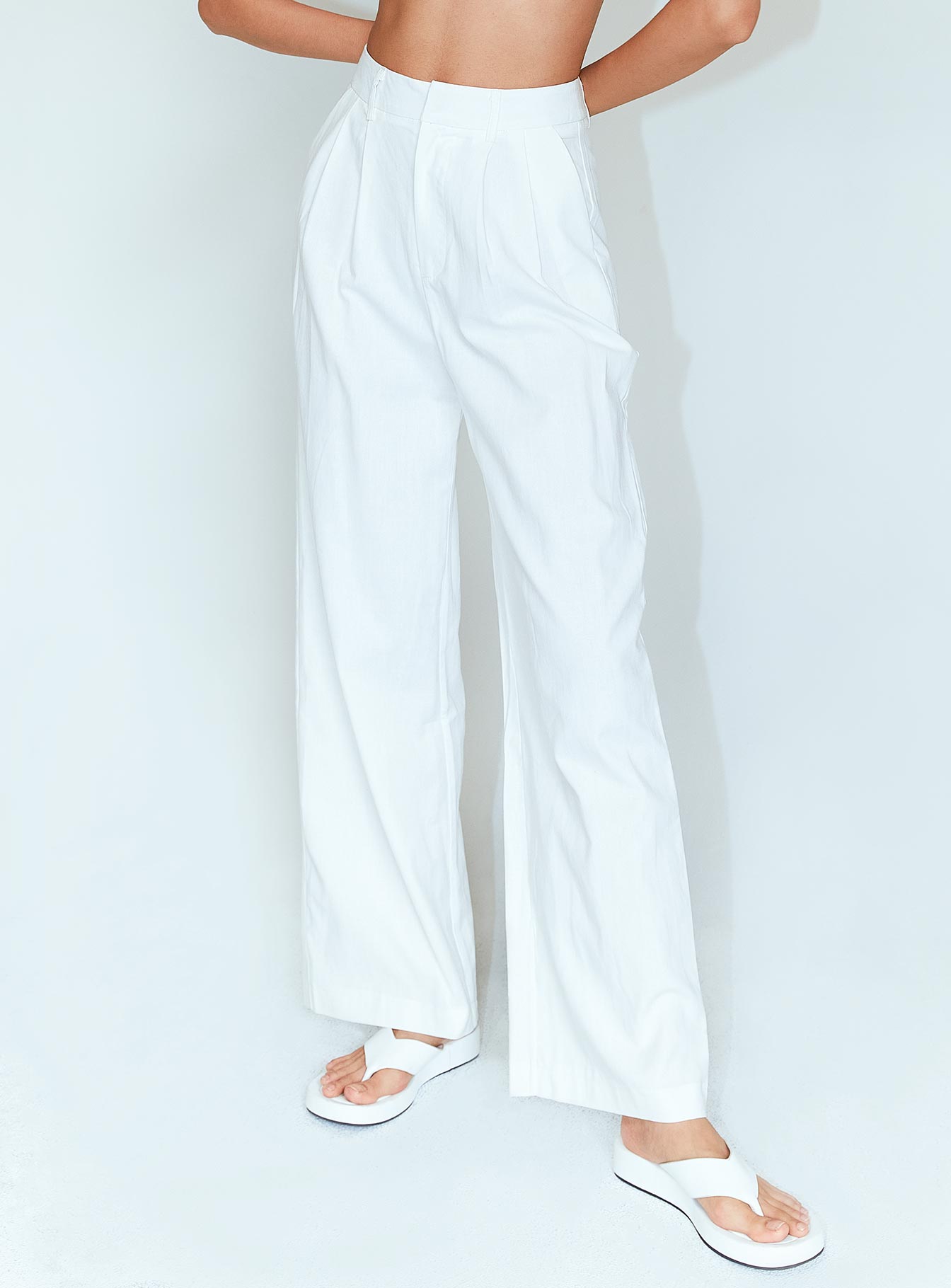 back view of model wearing Princess Polly Ayla Linen Pants White 
