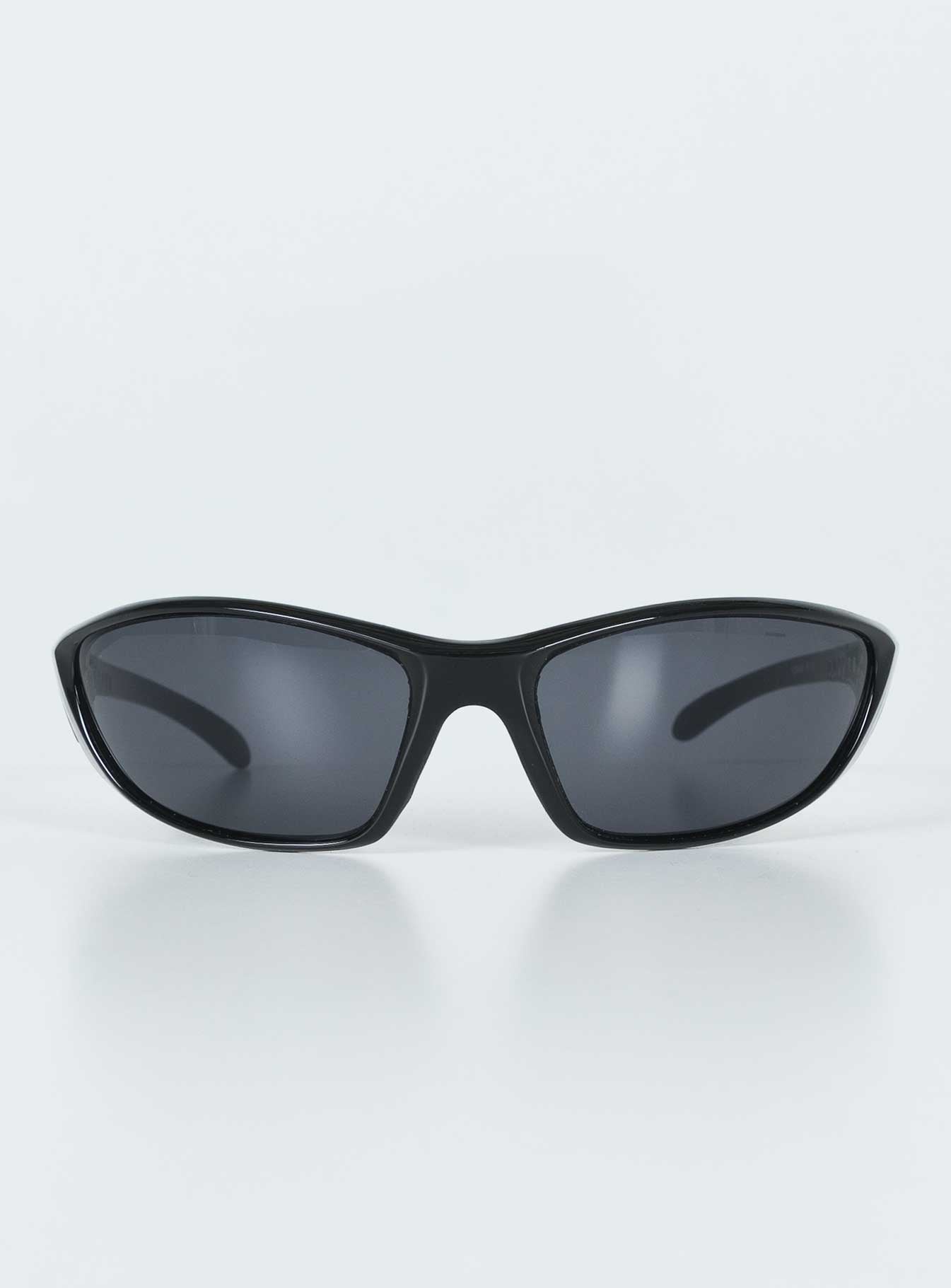 Sunglasses Wrap around design Light weight frame Black tinted lenses Moulded nose bridge