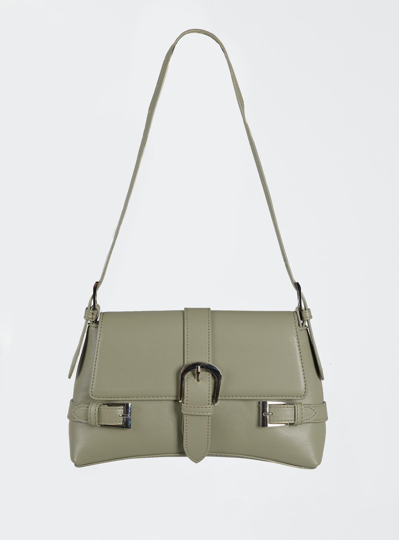 Shoulder bag Faux leather material Adjustable shoulder strap Magnetic button fastening  Buckle detail Silver-toned hardware