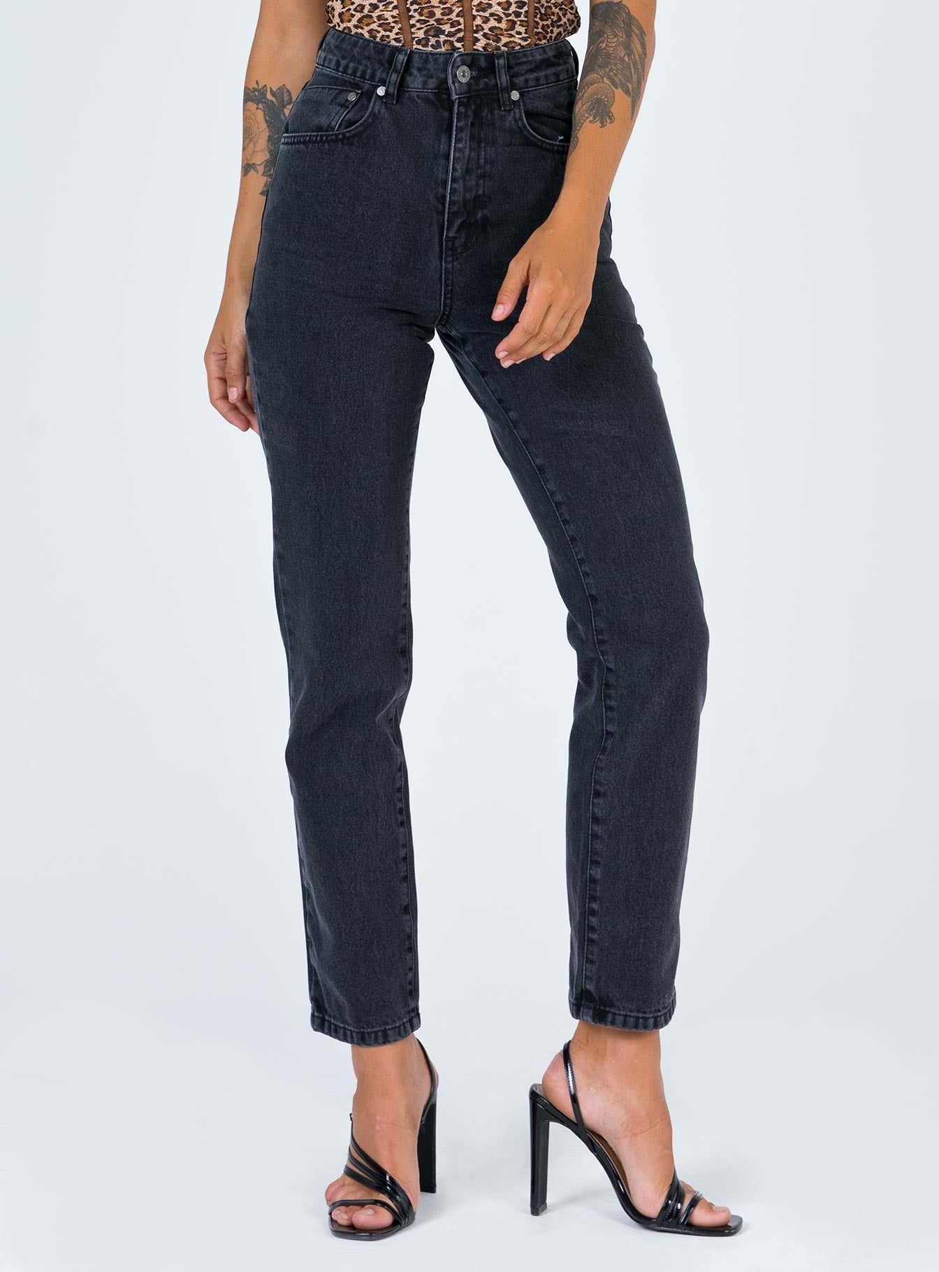 side view of model wearing Princess Polly Ragged Priest Butt Cut Jean Mid Rise 