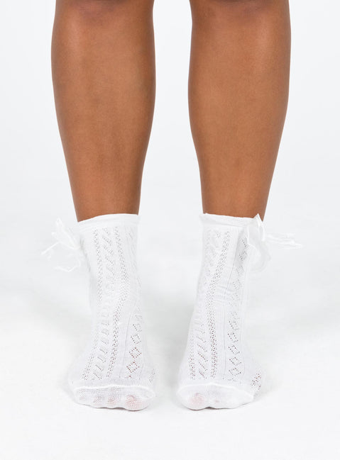 White socks Crew style Bow detail Good stretch Frill cuff For hygiene reasons, this item cannot be returned 