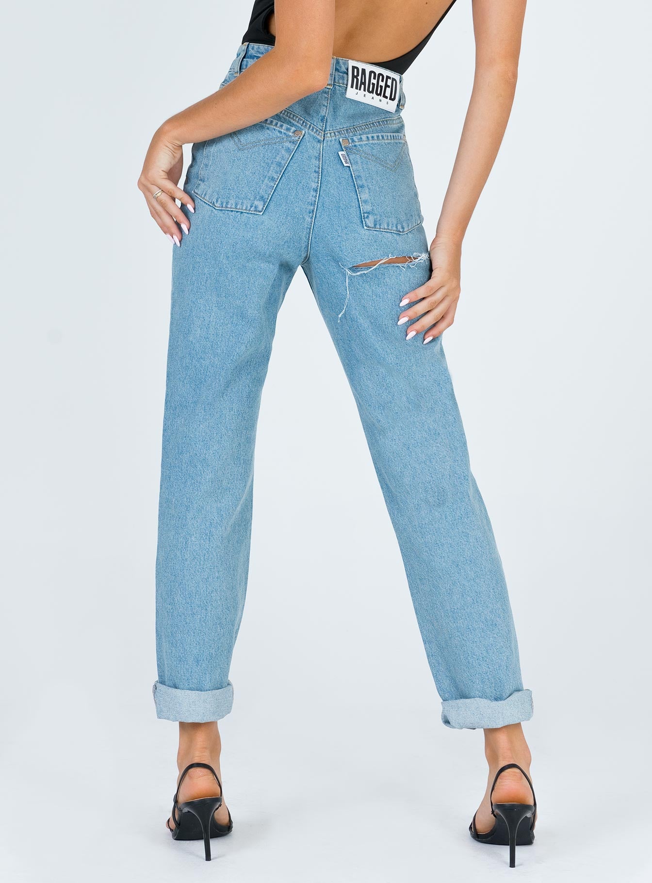 front view of model wearing Princess Polly Ragged Priest Butt Cut Jean Light Blue Mid Rise 