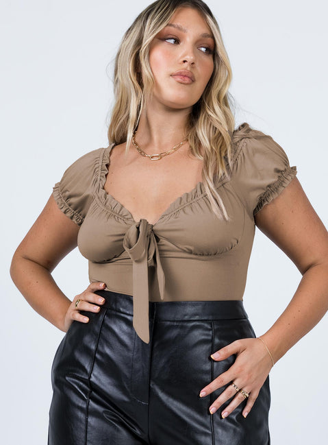 front view of model wearing Princess Polly Medina Bodysuit Brown Short Sleeves Plunger 