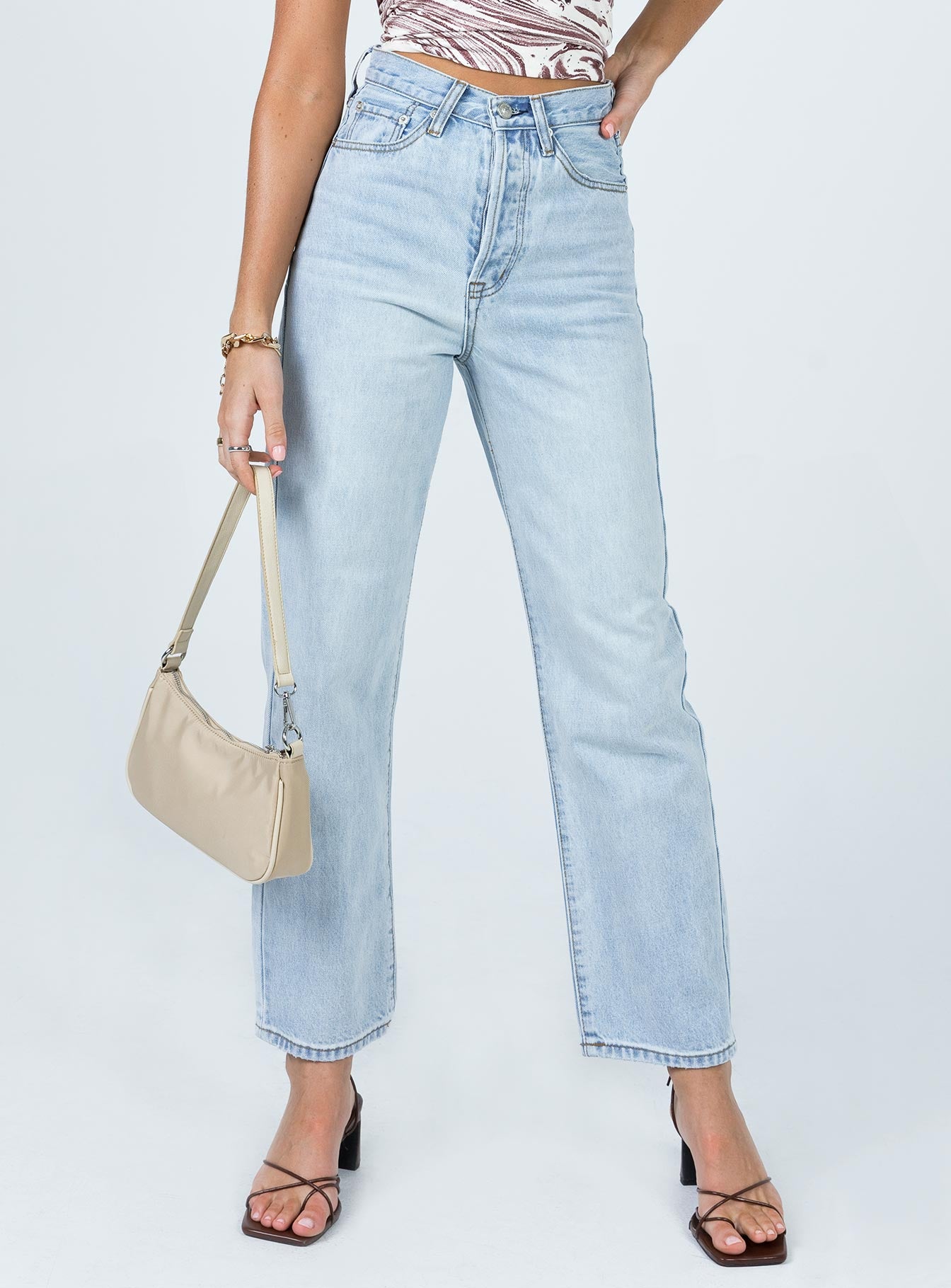 Front view of model wearing  front Princess Polly Mid Rise  Franklin Denim Jeans