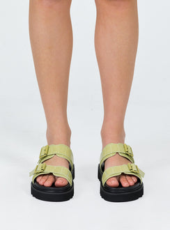 Black and green sandals Double upper strap Both adjustable Chunky treaded sole Padded footbed
