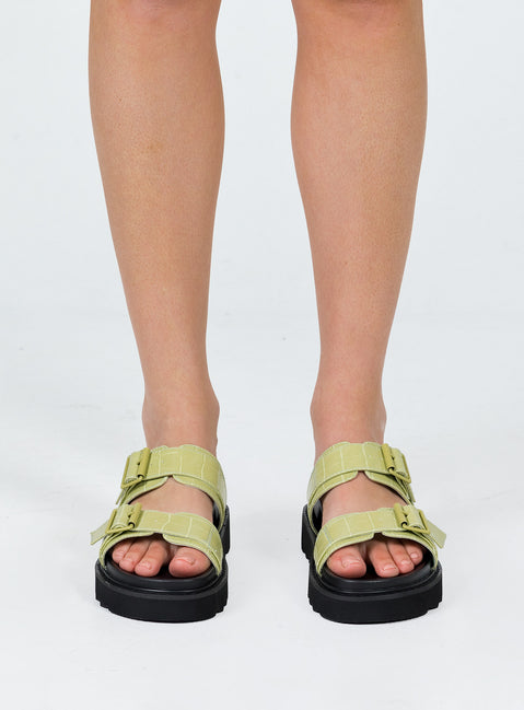 Black and green sandals Double upper strap Both adjustable Chunky treaded sole Padded footbed