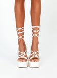 White heels Faux leather material  Strappy upper  Ankle tie fastening  Platform base  Block heel  Square toe 