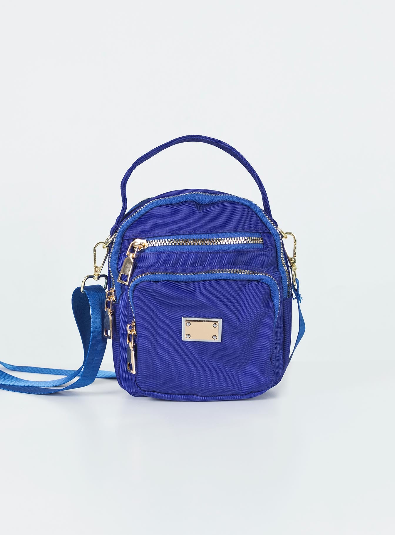 Crossbody bag  Princess Polly Exclusive 80% nylon 20% polyester Nylon material  Single handle Adjustable & removable crossbody strap  Four seperate compartments Gold-toned zip fastenings 