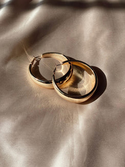 Earrings Gold toned Latch fastening Oversized hoop design