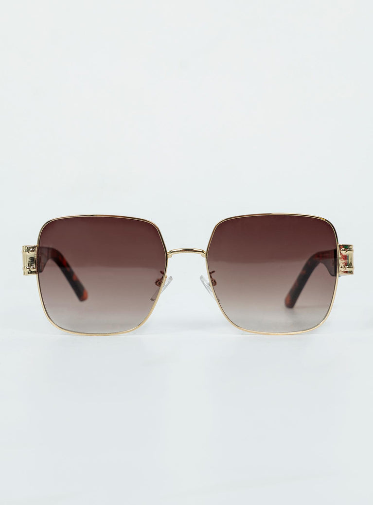 Oversized sunglasses Gold-toned metal frame  Tort arms  Ombre tinted lenses  Adjustable silicone nose pads 