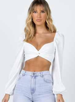 front view of model wearing Princess Polly Carson Long Sleeve Top White Lower Impact Full Sleeves Sweetheart 