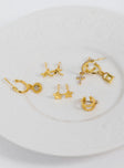 Earring pack Pack of nine  Two matching pairs Five single styles Stud, cuff & hoop styles All stud fastening Gold-toned