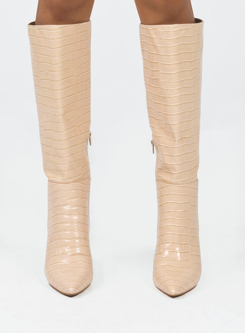 Boots Faux croc leather  Knee-high  Stilleto style heel Pointed toe  Padded inside  Exposed zip on inner side 