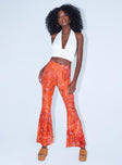 front view of model wearing Princess Polly Tayler Flare Pants Orange 