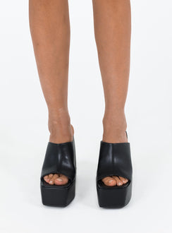 Platform heels Faux leather material Single thick upper Platform base Block heel Square toe