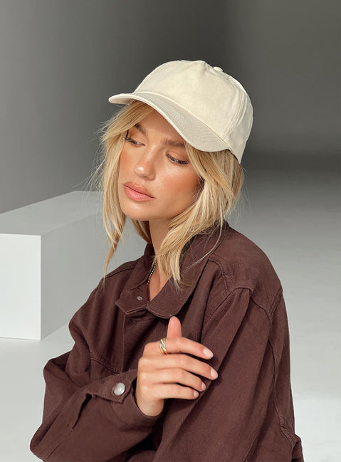 Cream cap Adjustable strap at back