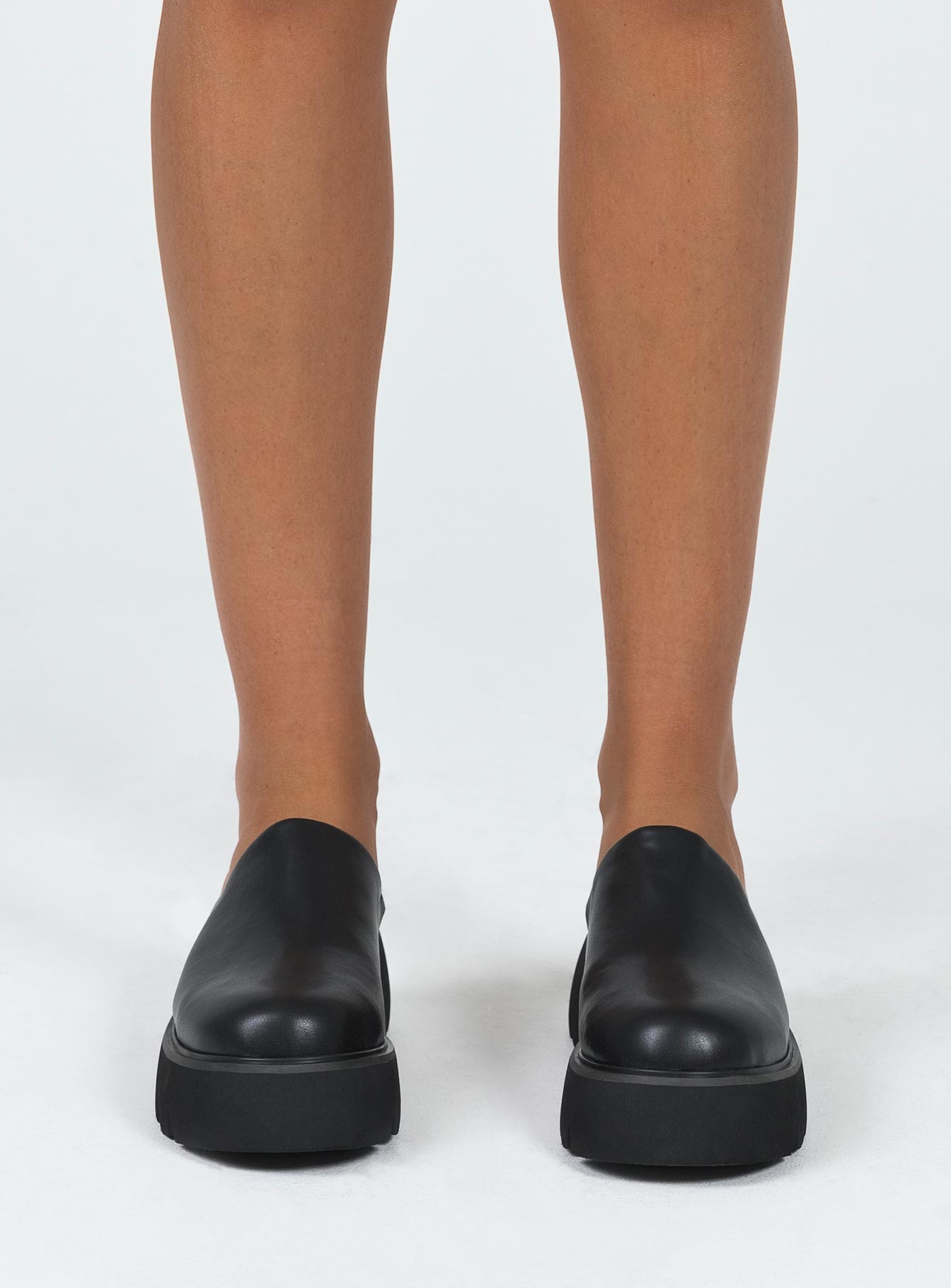 Slides Rounded close toe Slide on design Treaded sole Padded footbed