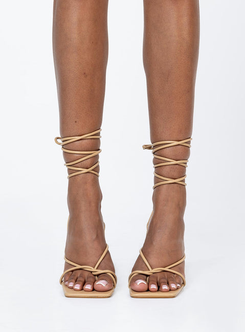 Heels Faux leather material  Strappy upper  Ankle wrap tie fastening Square toe  Stiletto heel 