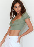 side view of model wearing Princess Polly Austin Top Green 