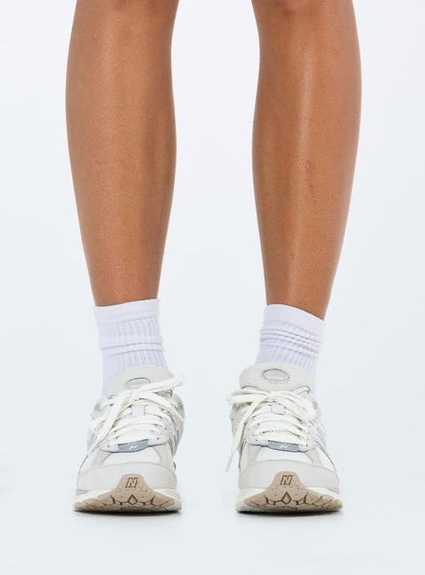 Sneakers  Faux suede and mesh material  Lace up style  Platform base Padded inner  Treaded sole 