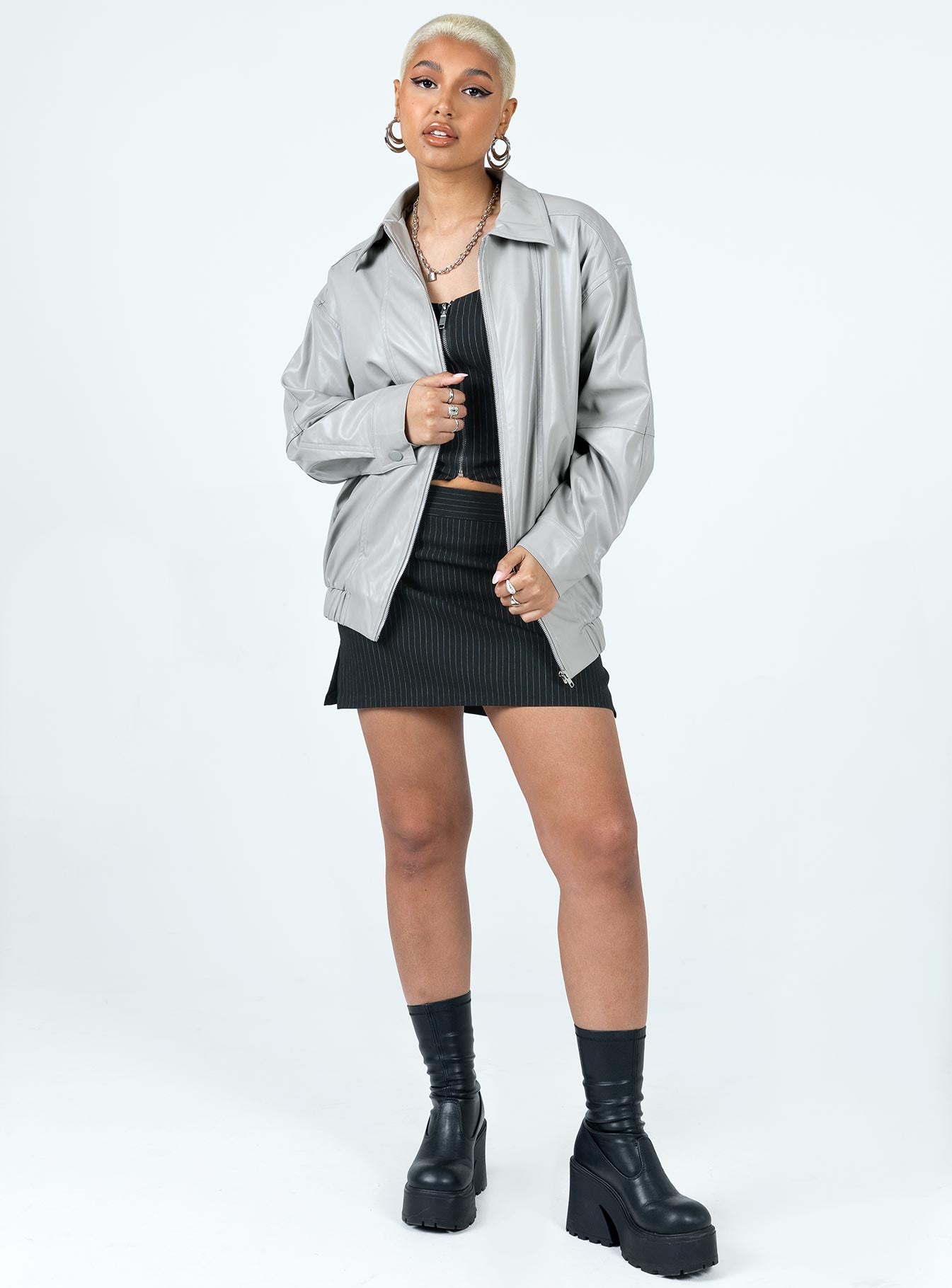 Grey bomber jacket Faux leather material Pointed collar Zip front fastening Twin hip pockets Elasticated waistband