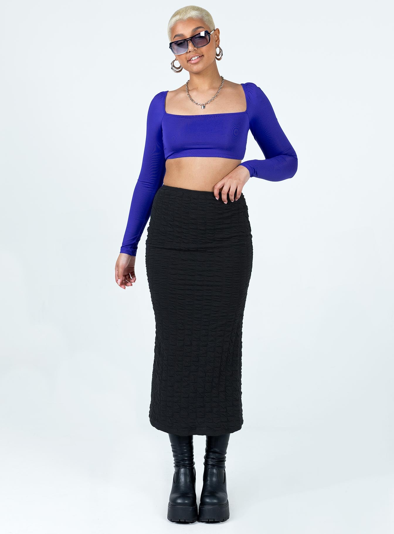 side view of model wearing Princess Polly Rogers Long Sleeve Top Blue Full Sleeves Square Neck 