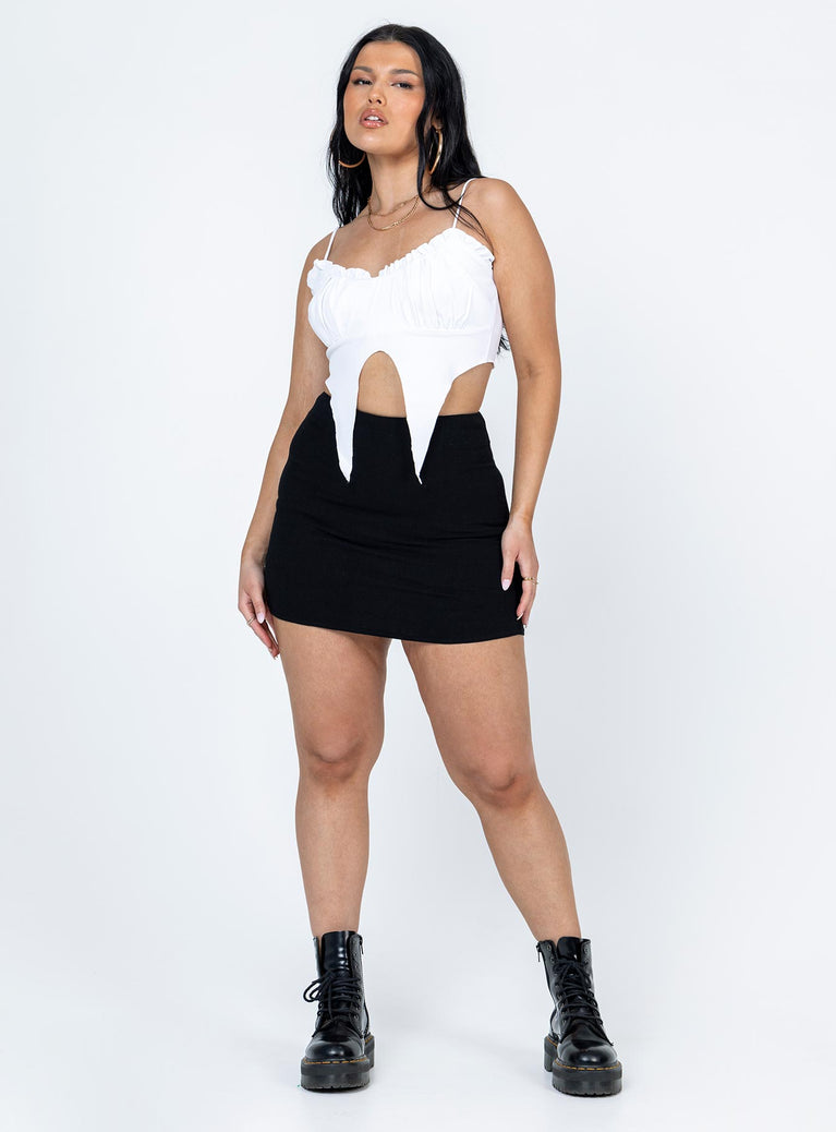 Front view of model wearing  front Princess Polly Sleeveless Square Neck  Arndell Top White