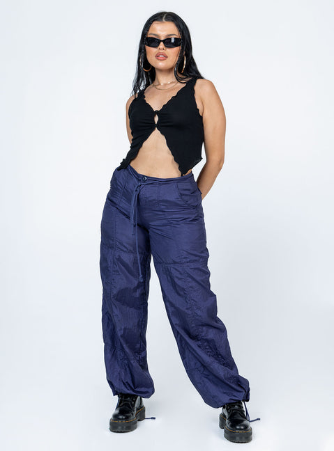 front view of model wearing Princess Polly Amyra Top Black Sleeveless V-Neck 