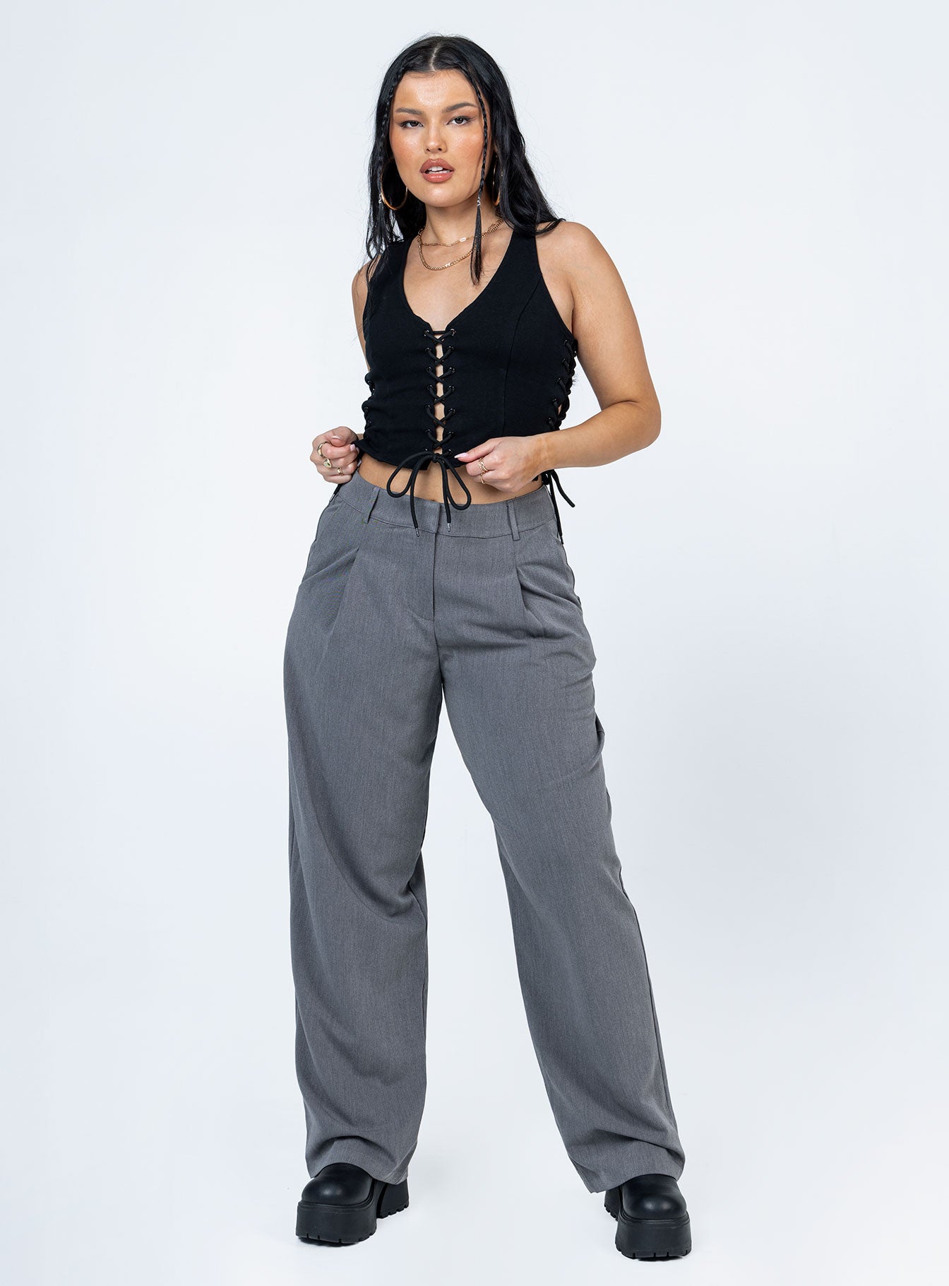 front view of model wearing Princess Polly Walker Top Black Sleeveless Scoop Neck 