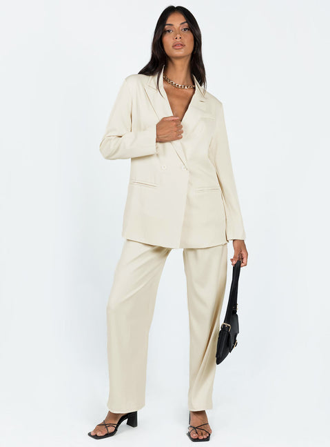 Blazer Silky material  Lapel collar  Double-breasted  Twin hip pockets  Non-stretch 