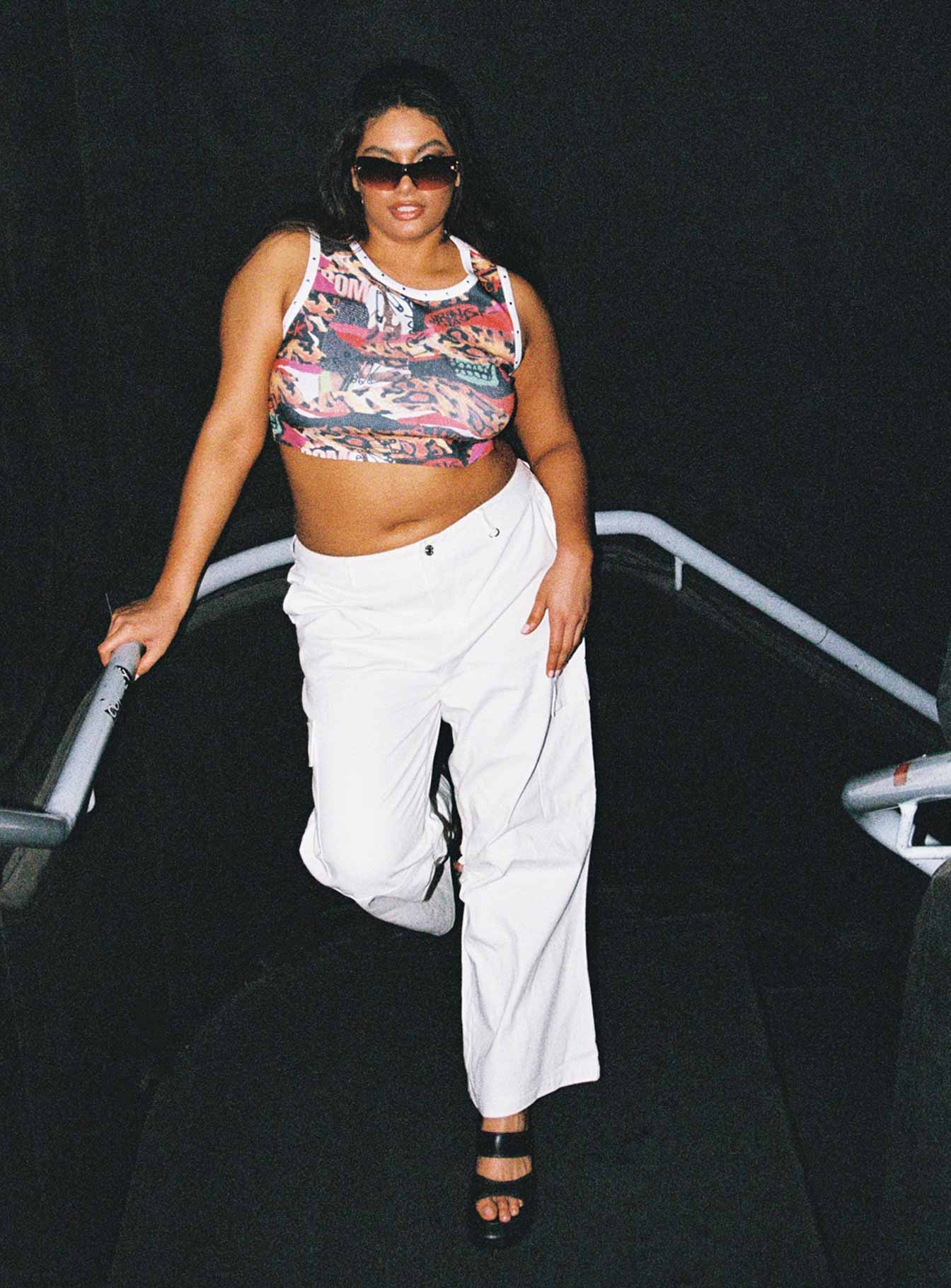 side view of model wearing Princess Polly Main Stage Tank Top Multi Curve 