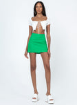 Front view of model wearing  front Kariss Mini Skirt Green Princess Polly  Mini Skirts Mini Skirts 